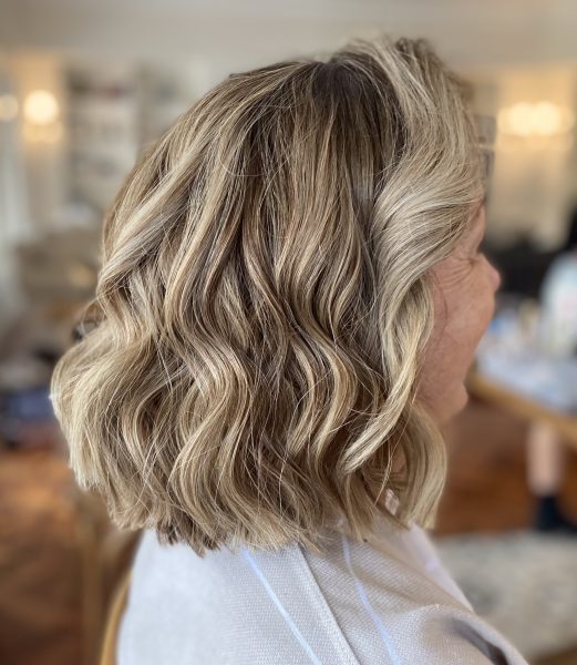 Luxury hair styling services at MWC Hair by Mitch, offering expert blowouts, waves, and sleek finishes in Newcastle.