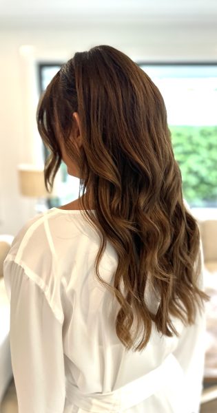 Luxury hair styling services at MWC Hair by Mitch, offering expert blowouts, waves, and sleek finishes in Newcastle.